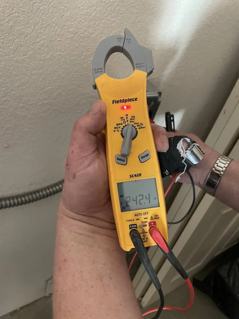 Voltage testing with clamp meter during Aluminum Wiring Replacement in Independence